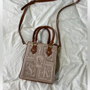 Elegant Brown Embossed Handbag